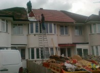 Photo shows unprotected work at height