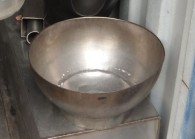 Photo shows the open bowl used to hold the acetone that ignited