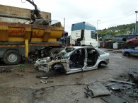 Photo shows the car which fell on a young mechanic at North End Salvage Services in Stalybridge