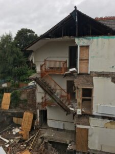 Partial building collapse as a result of unplanned excavation work