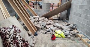 Concrete blocks that had been stored on the upper floor